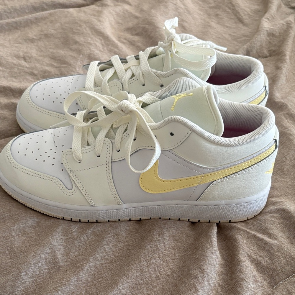 Nike Cream and Yellow Jordans